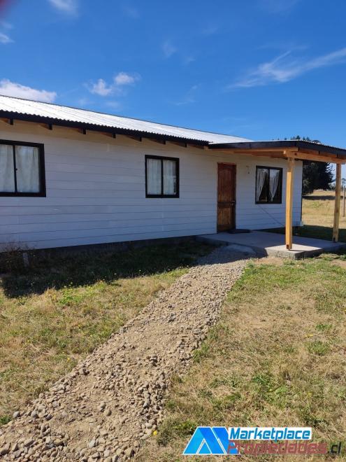 Vendo parcela con casa