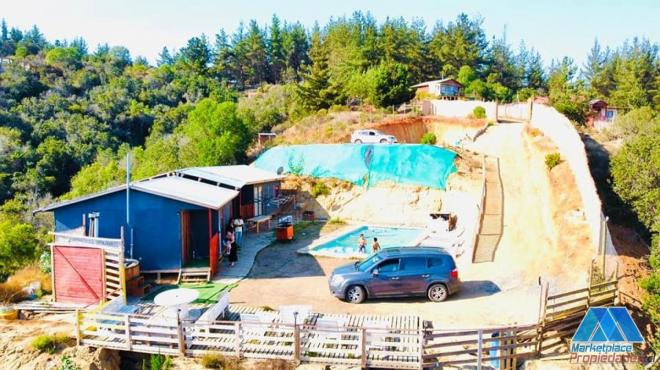 VENTA PARCELA CON DOS CABAÑAS CASABLANCA