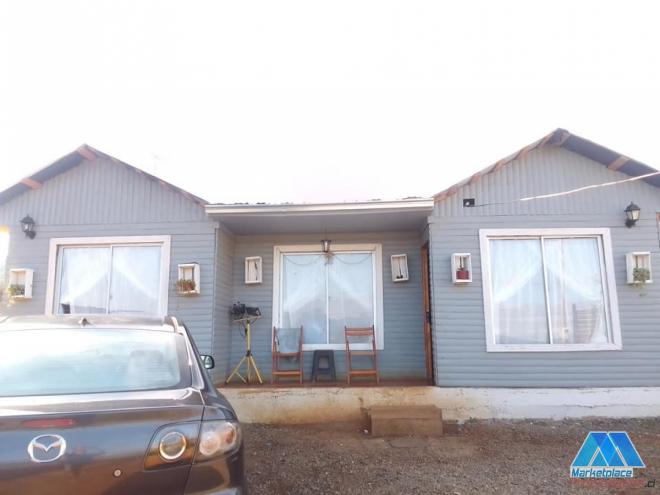 Venta terreno 1000 m con rol propio, con dos casas