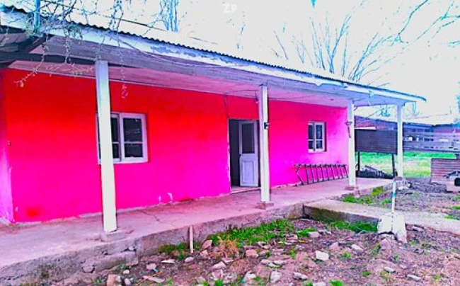 Casa de adobe (1940) recubierta en cemento