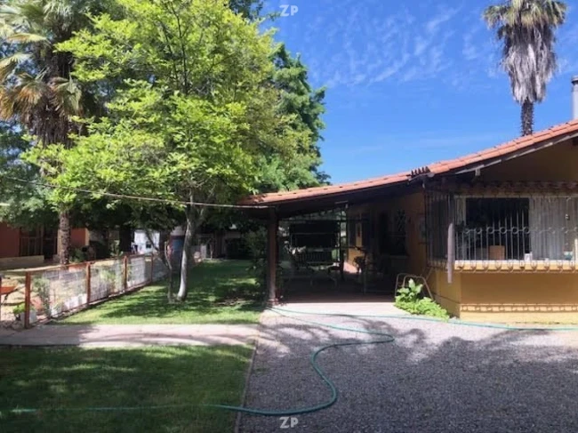Hermosa Parcela de 4 hectáreas con Casa cuidador