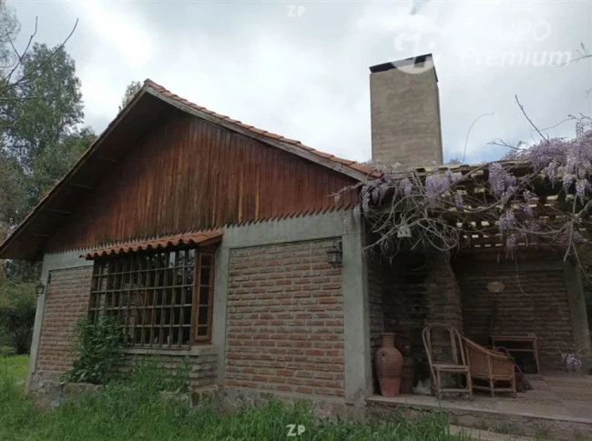 Venta de Parcela con Casa Estilo Colonial