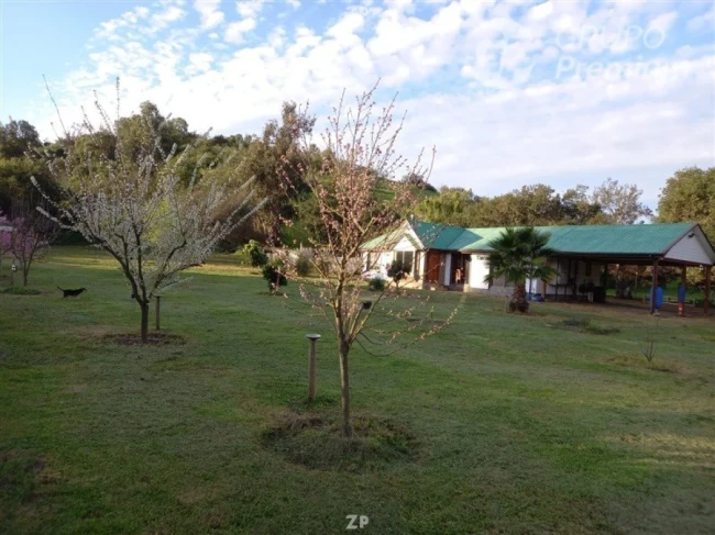 Venta de Parcela con Hermosa Casa amoblada