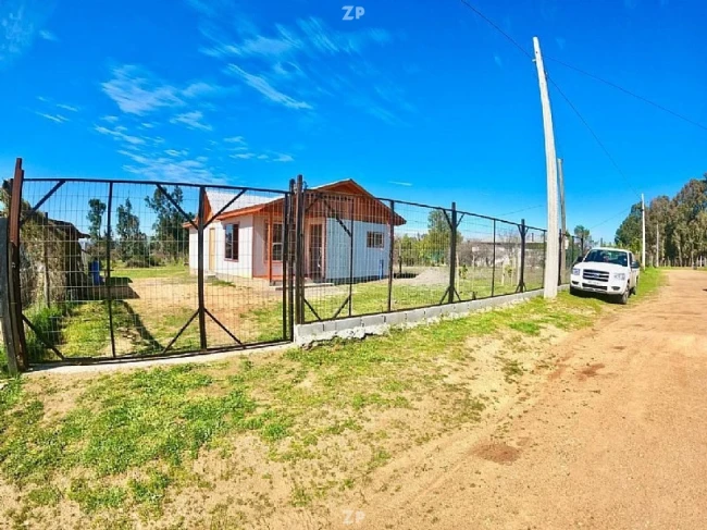Parcela en venta con CASA NUEVA  A ESTRENA