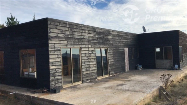 Parcela con Casa en Condominio Piedra del Sol