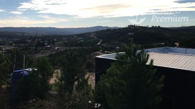 Parcela con Casa en Condominio Piedra del Sol