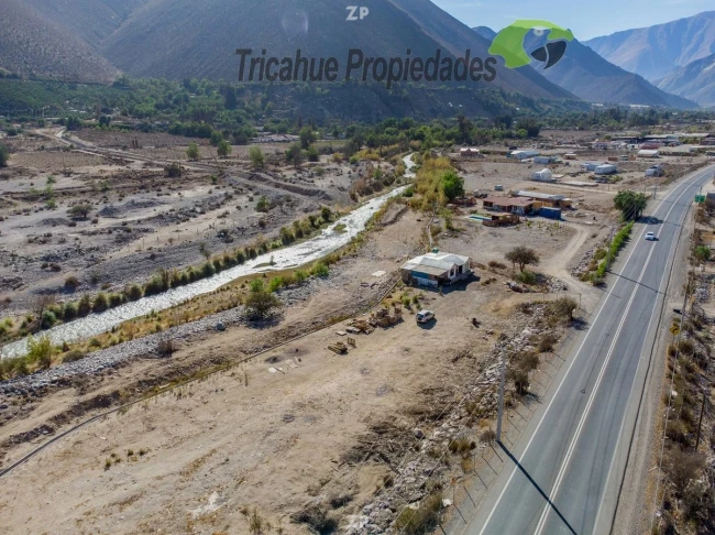 Venta de parcela con cabaña, orilla de rio, electricidad