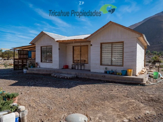 Venta de parcela con cabaña, orilla de rio, electricidad