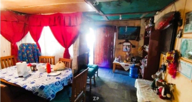 En venta  propiedad incluye una casa construida en material ligero