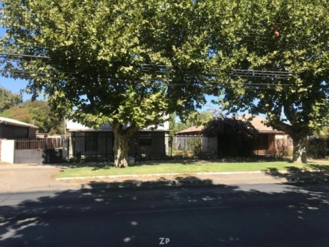 Se Vende Amplia Parcela con casa construída en Molina