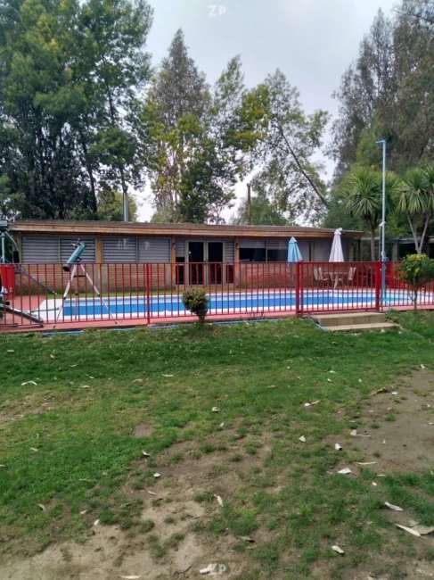 En venta casa emplazada en Parcela de Media Hectàrea