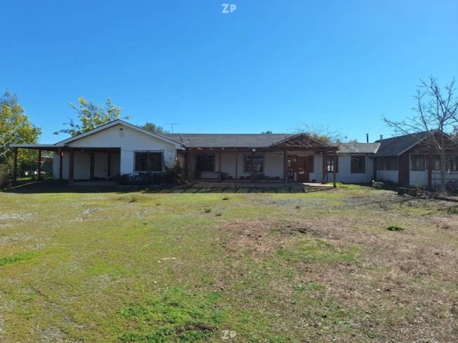 En venta Casa y Parcela de Media Hectárea
