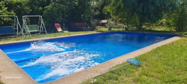 En venta Parcela con casa solida y piscina a minutos de Linares
