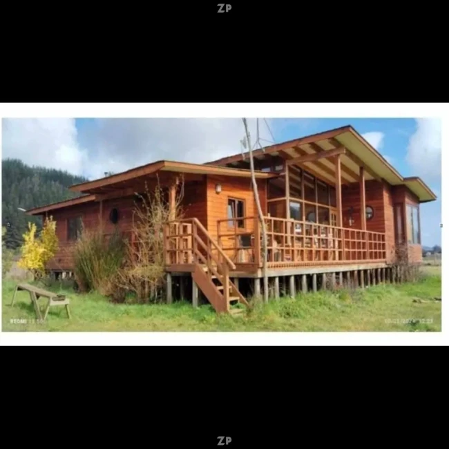 Parcela de 5000m2 con casa moderna-rústica y vista al campo