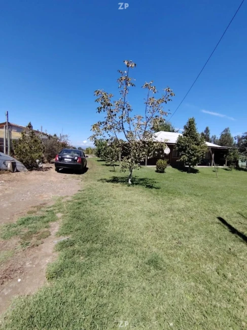 Parcela con casa