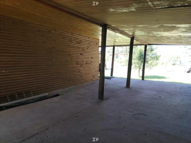 Parcela con casa