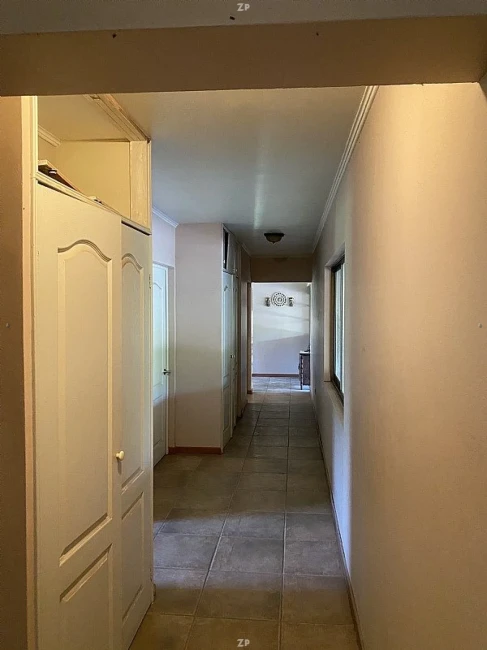 Parcela en venta con dos casas, cabaña, quincho y acceso privado