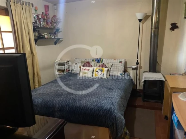 Parcela en venta de 5 dormitorios y 5.100 m² con calefacción a leña