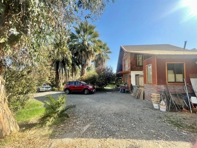 Parcela en venta con casa de 3 dormitorios, bodega y pozo de agua