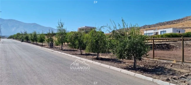 Parcela en venta de 5.091 m² con cierre perimetral y árboles frutales