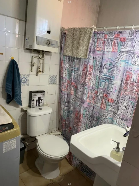 Casa en Venta Frente al Colegio Mackay | 2 Dormitorios y Patio