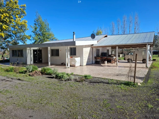 PARCELA 1 HA + 2 CASAS + PISCINA + RÍO | $150.000.000