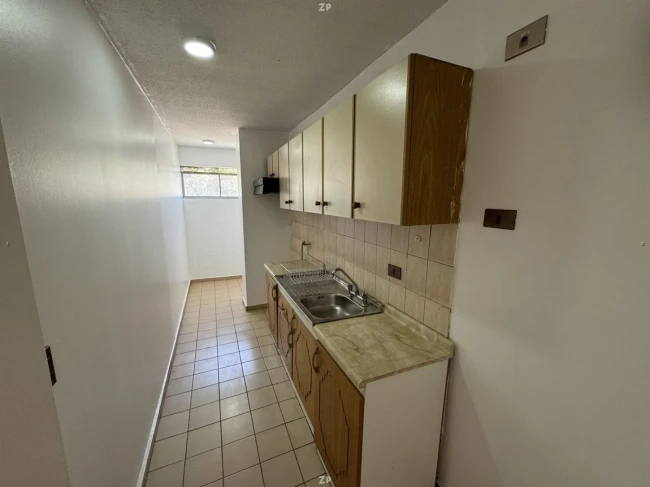 Departamento en Venta en La Florida | 2 Dormitorios, Piscina y Estacionamiento